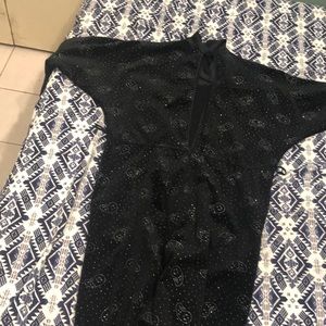 One size fits all sparkly black onsie